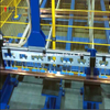 Système de stockage automatique multifonctionnel de matière première de barre omnibus