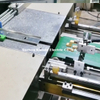 Machine de traitement de profilés en aluminium